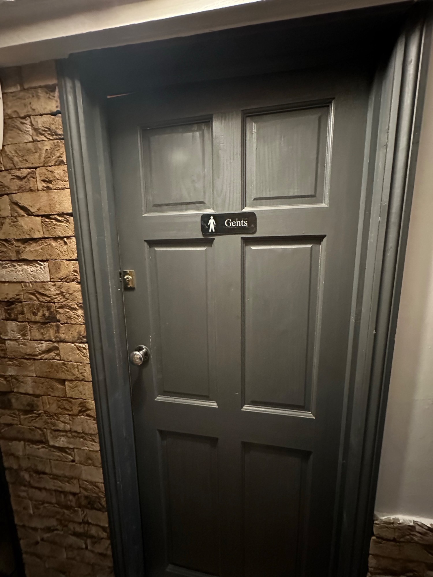 Grey bathroom door - push from left.