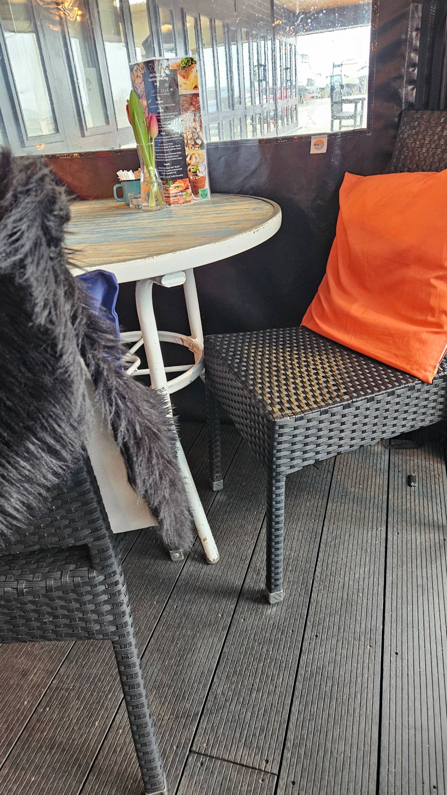 Ratten chairs under a table