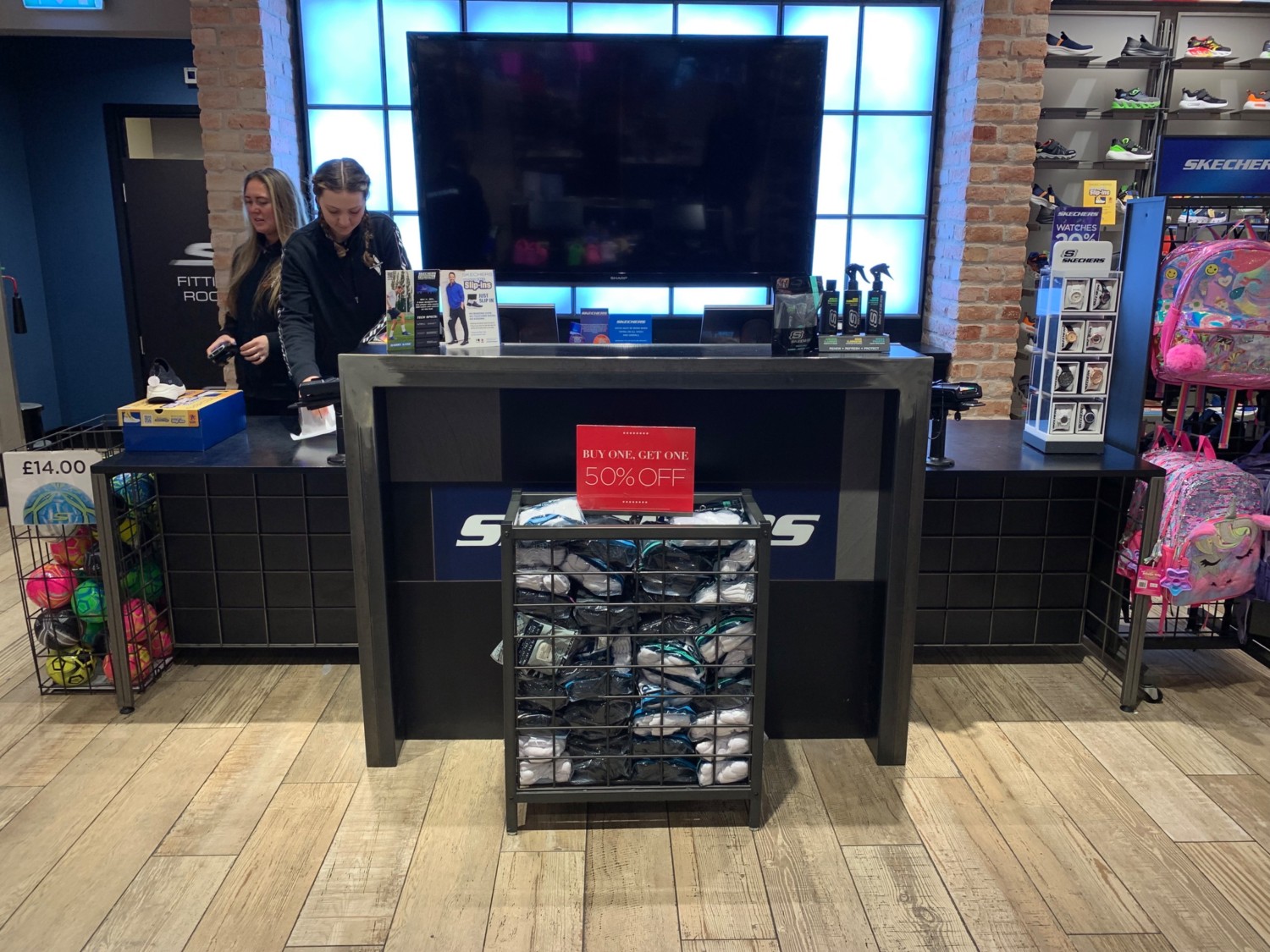 From after product display, looking right. Counter ahead.
