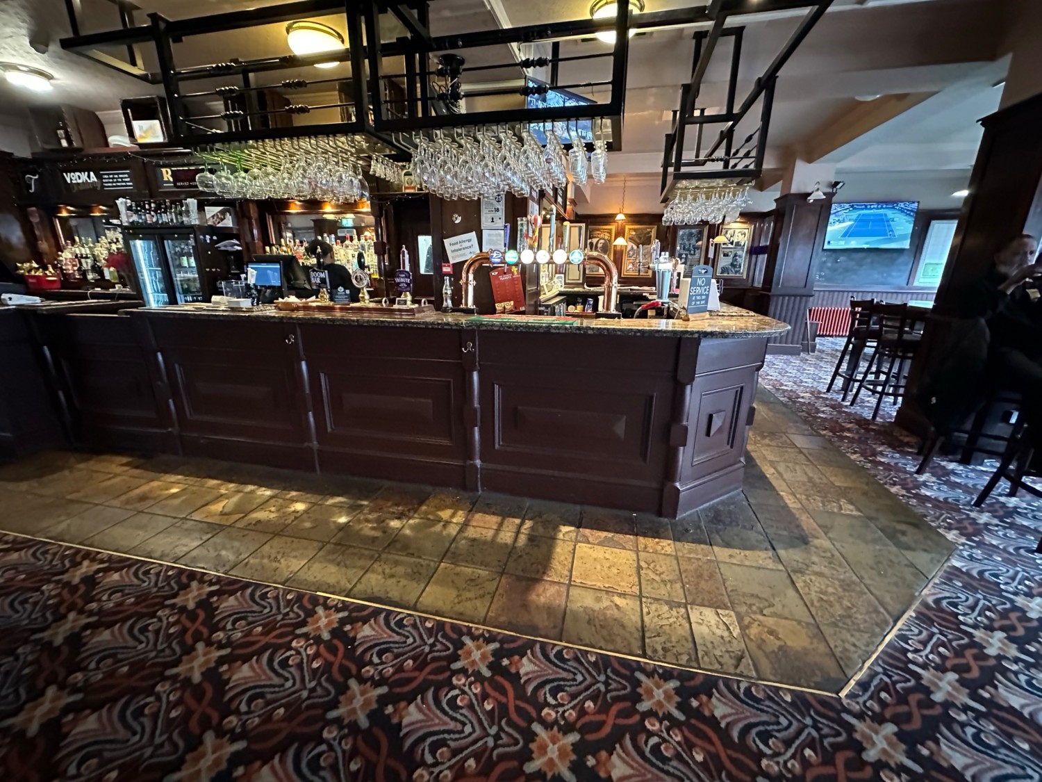 From booth facing rigjt. Start of bar counter ahead.