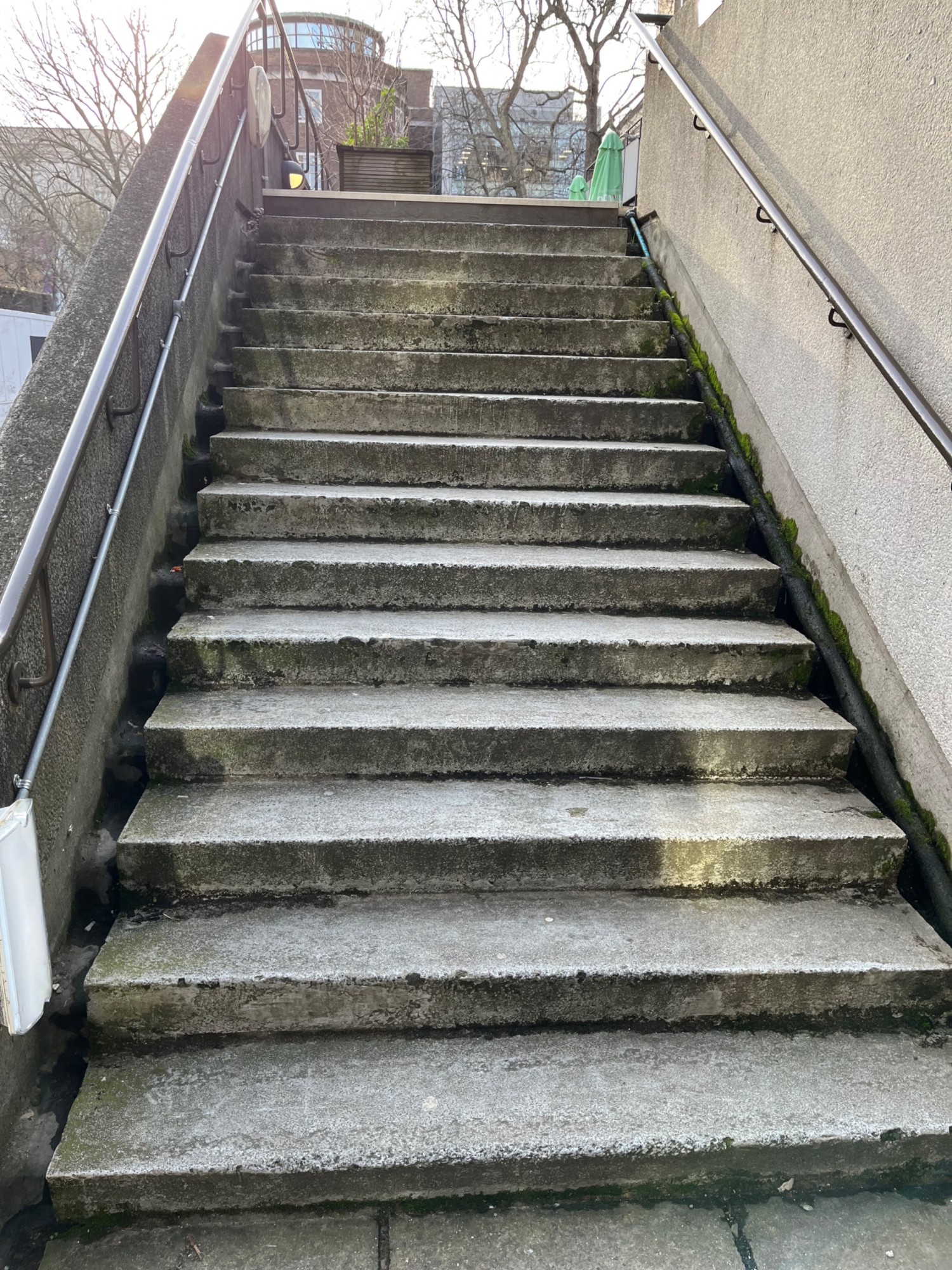 There are 15 more steps up to the main terrace and front door of the venue.