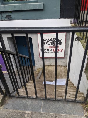 9 steps descending to doorway