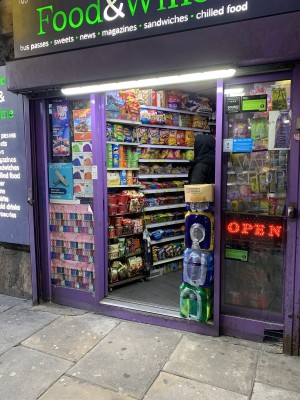 Entrance open on to street, large step