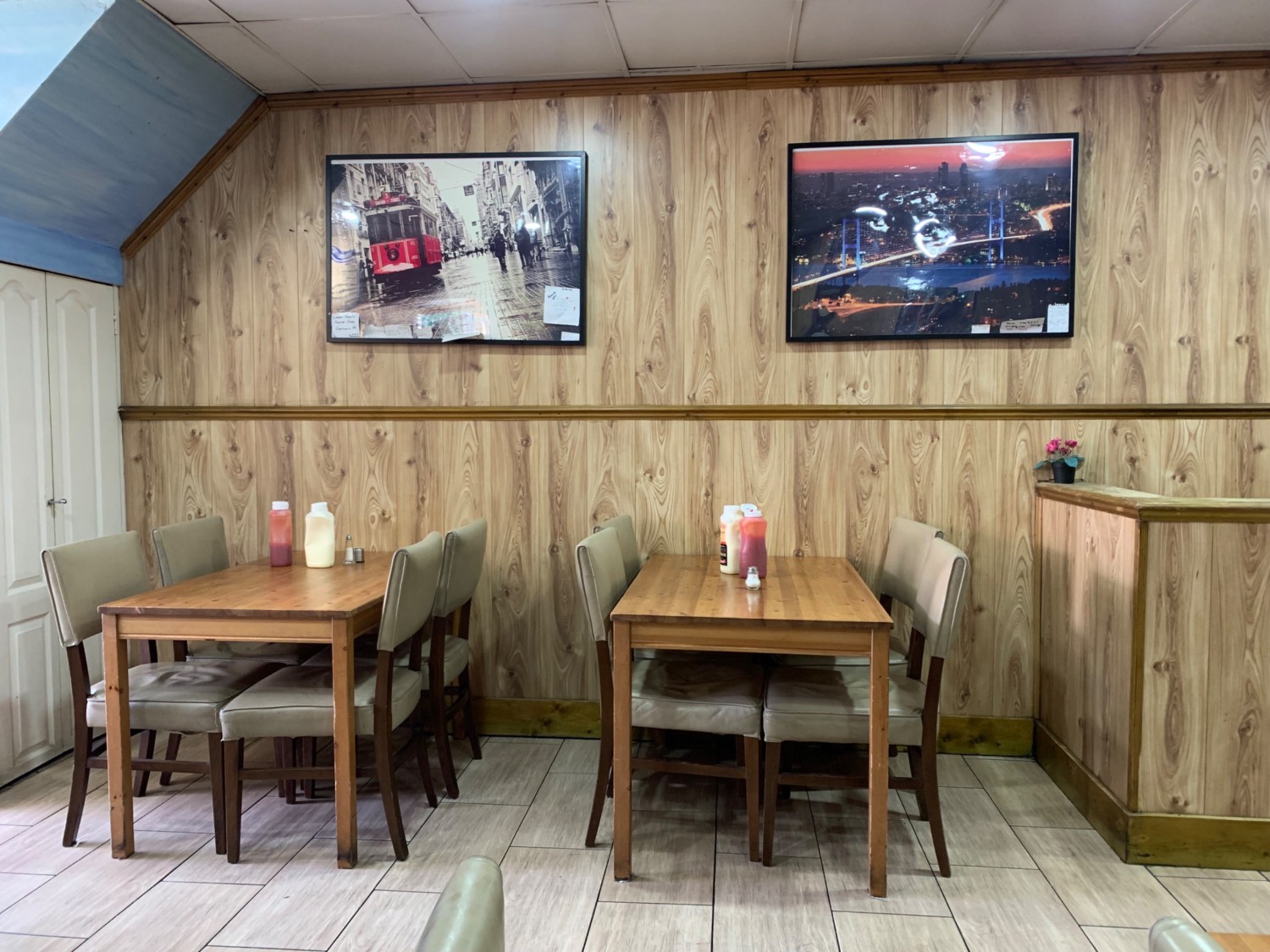 From end of counter facing left. Seating along back wall.