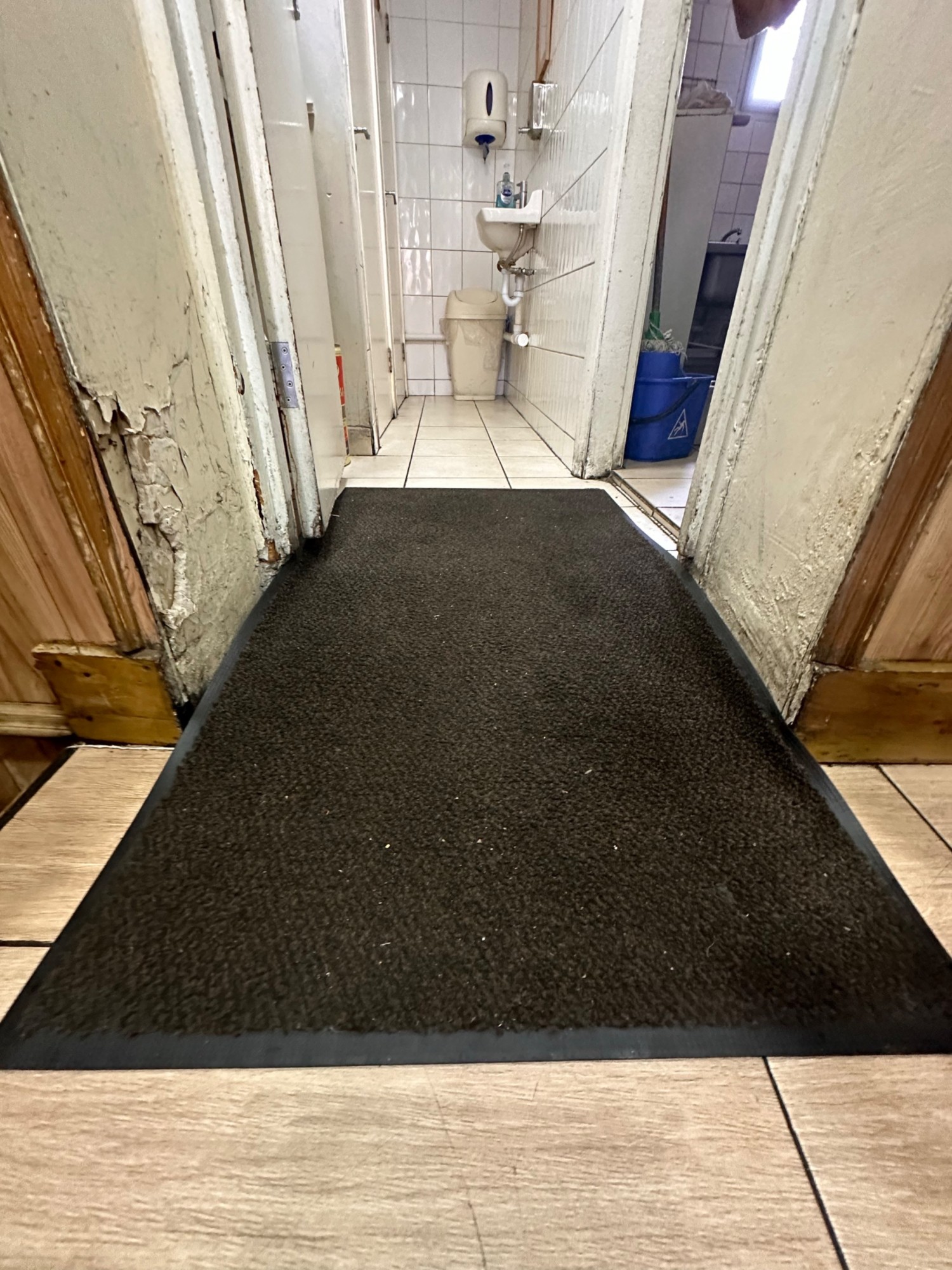 Small ramp leading up to door.