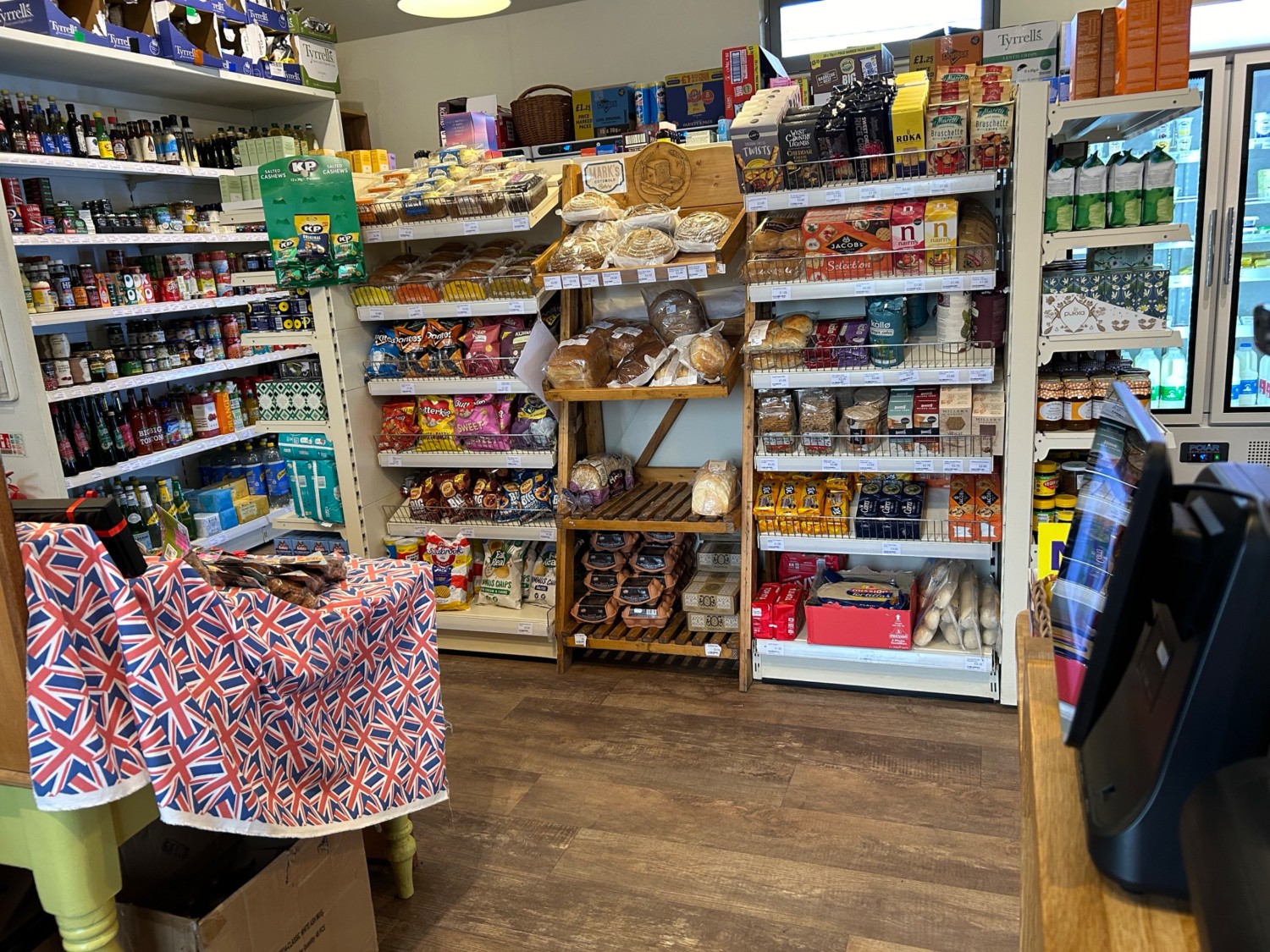 The shelves in the centre mean it’s a bit tight to get round to the fridges but just about possible in a large powerchair