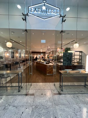 Glass doors. Push silver handles in centre to open.