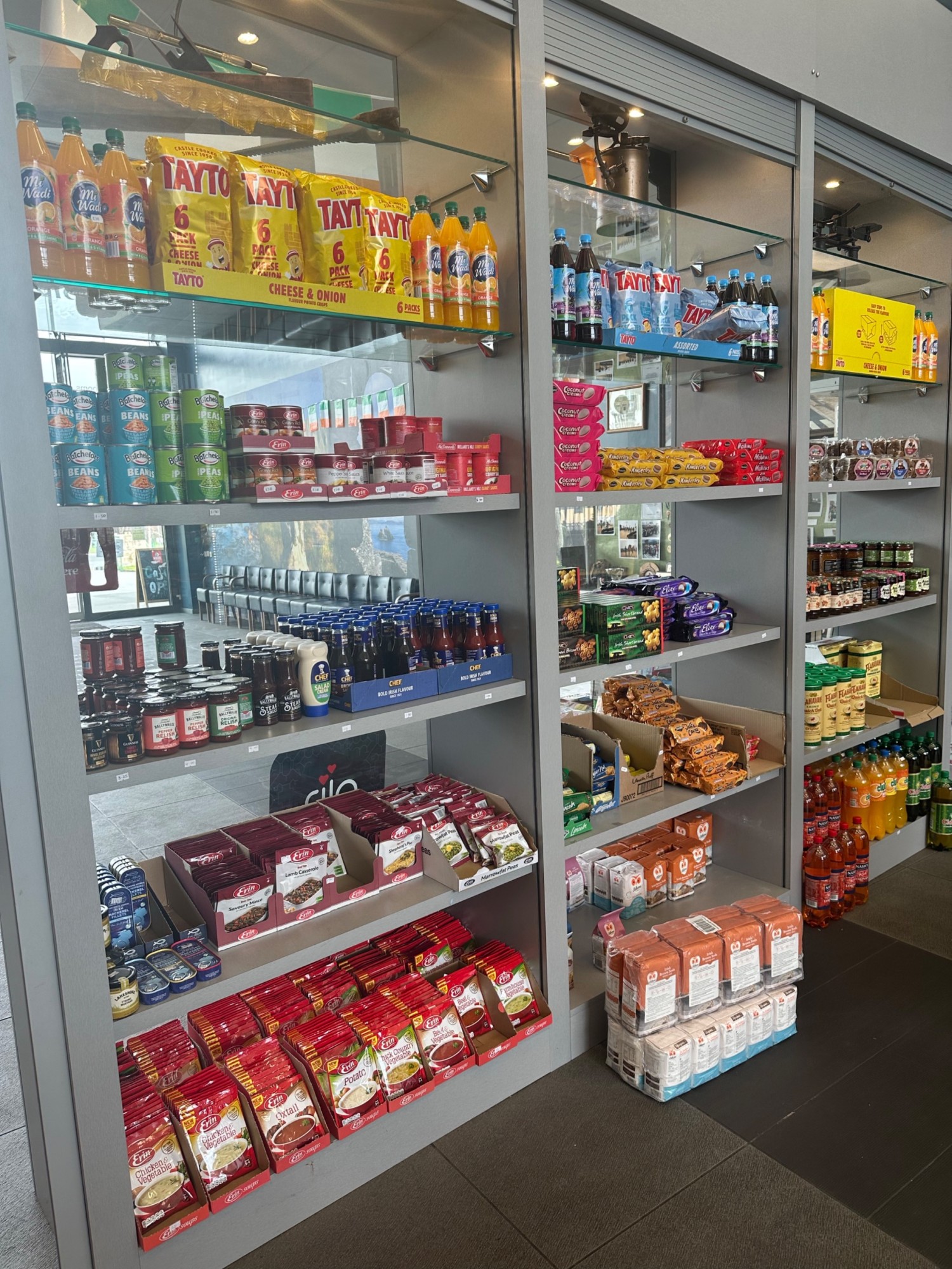 The shop and cafe shelves. Some items on high and low shelves but the staff are helpful. Plenty of floor space.