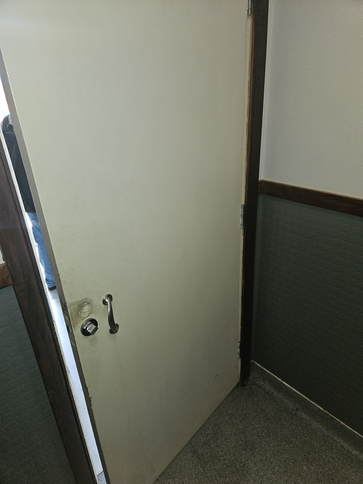 The inside of the door to the bathroom