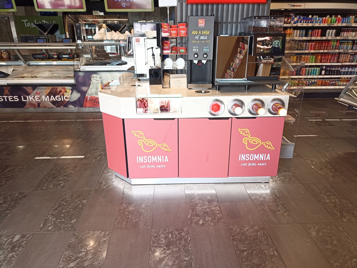 Coffee machine right ahead from the entrance