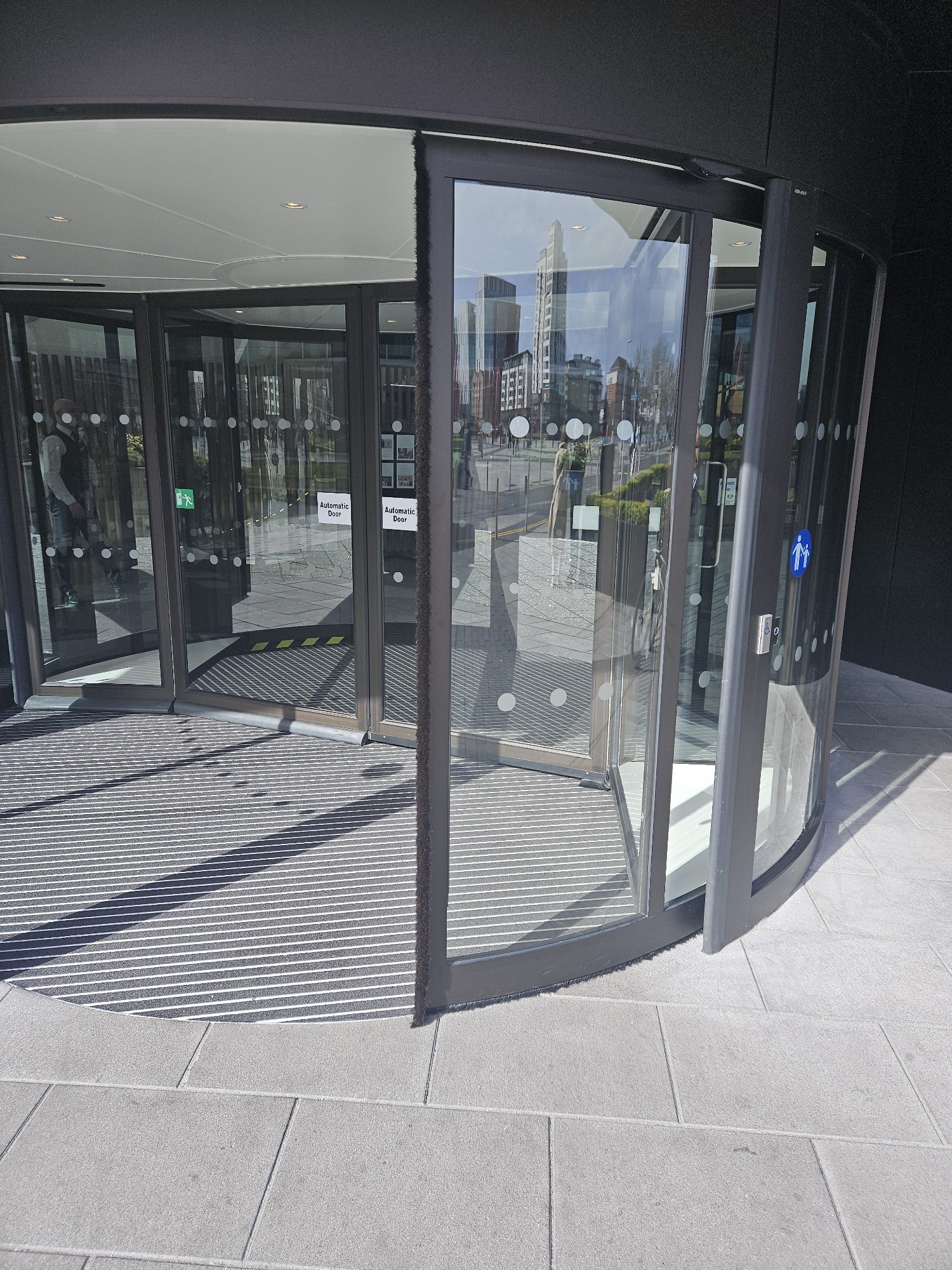 The outside revolving door entrance