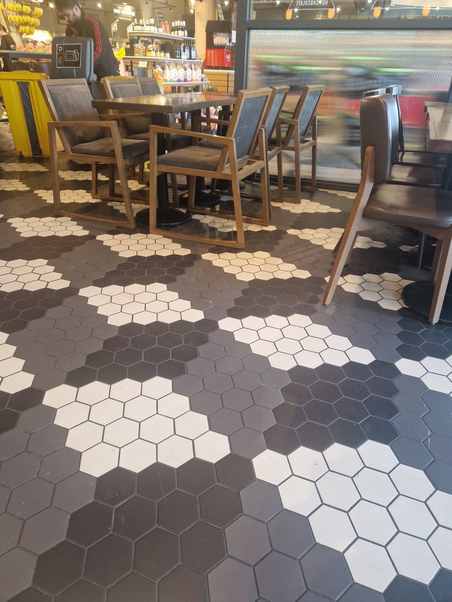 Patterned floors and tables.