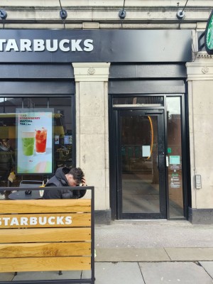 No ramps and no steps. Very easily accessible. The door is automatic currently due for a repair.