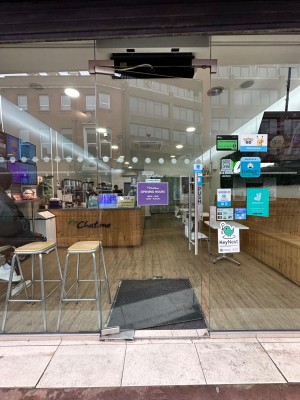 Glass door. Push handle on right to open