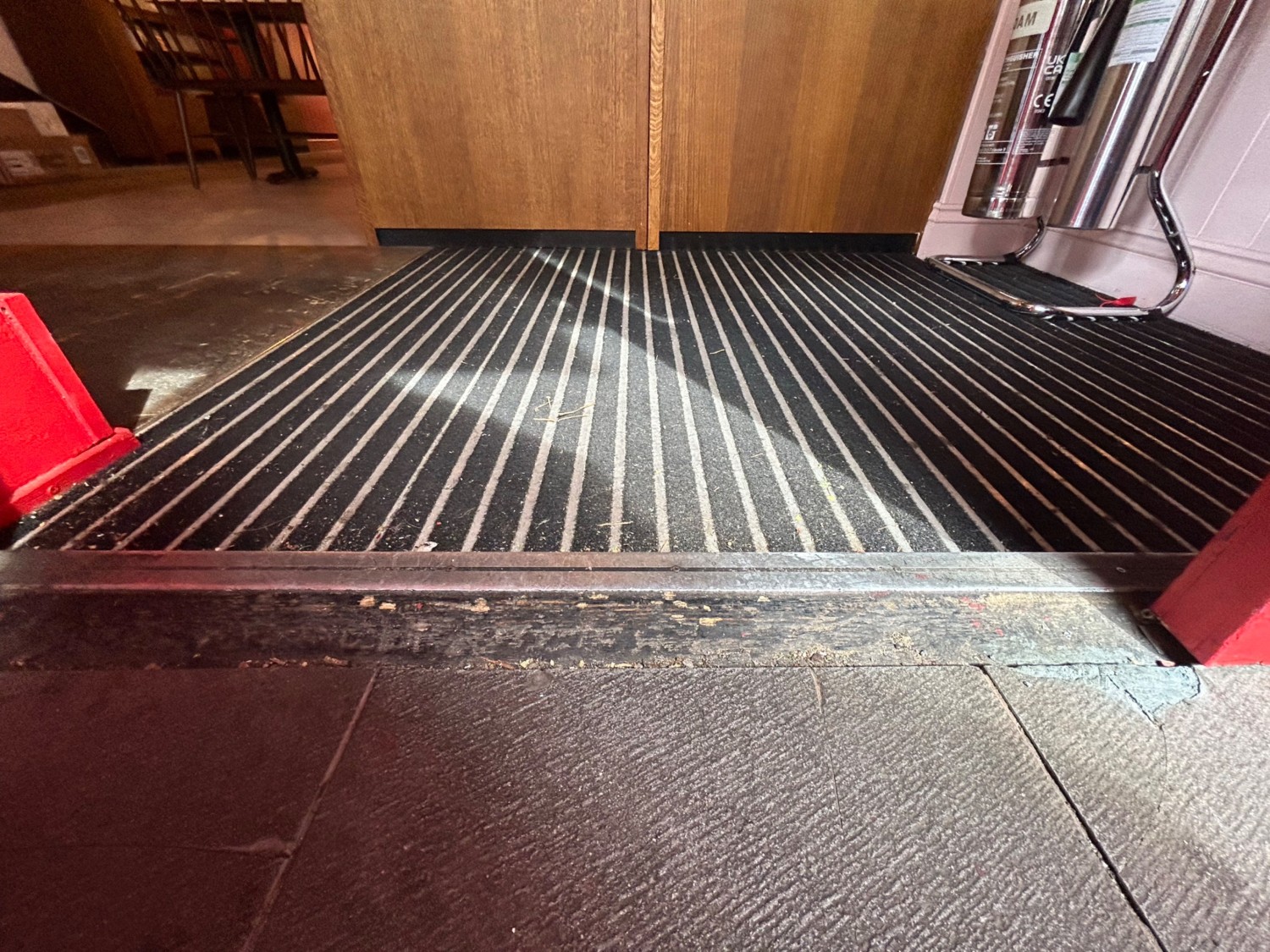 Small bump at foot of door.
