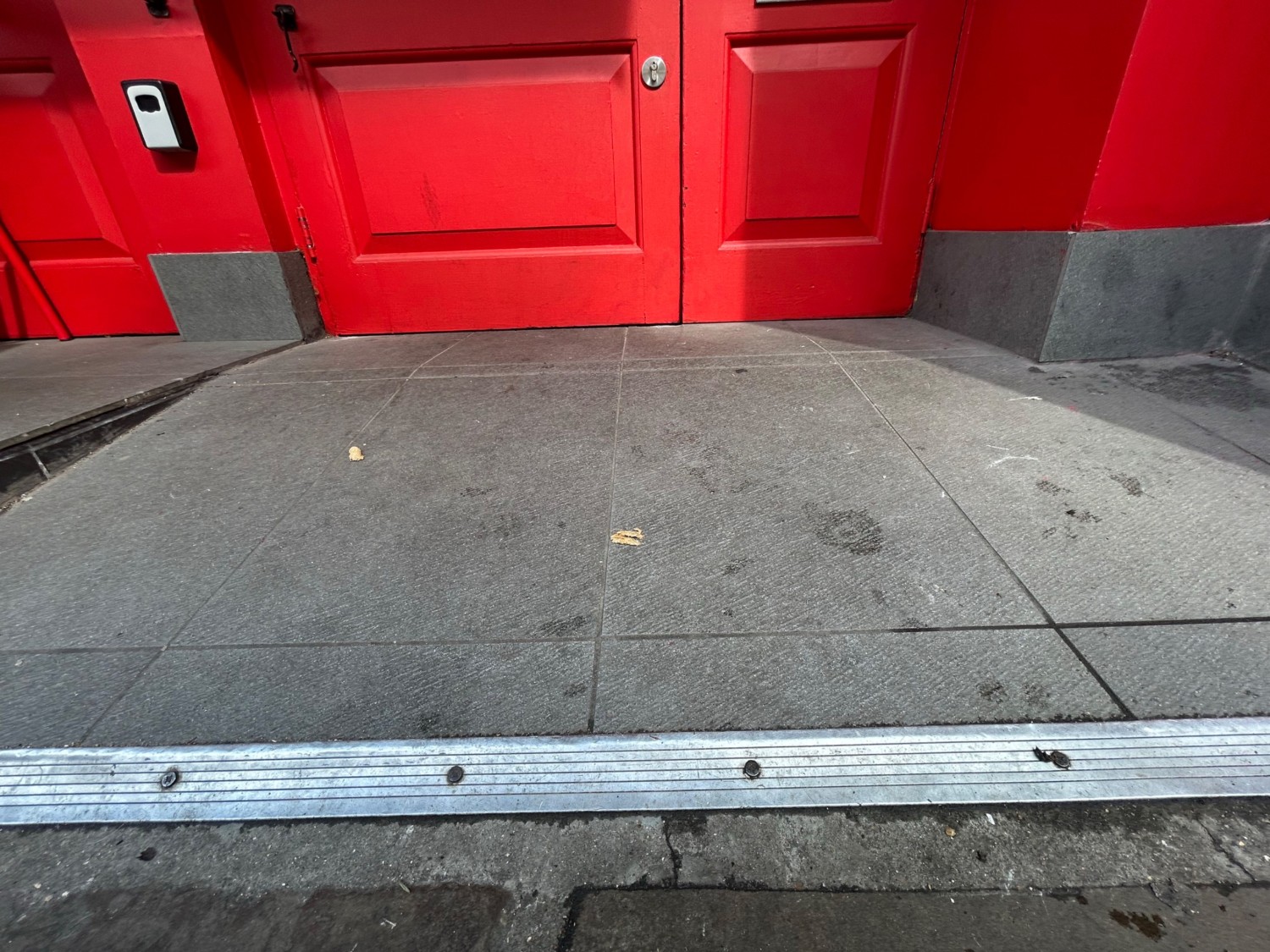 Small bump then built in ramp up to doorway.