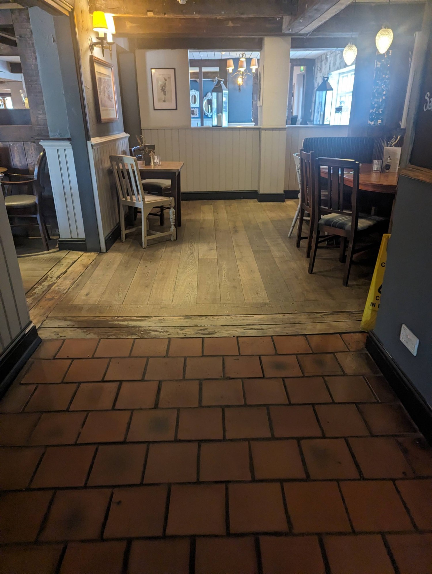 The first dining section as you come through the doors closest to the disabled parking area