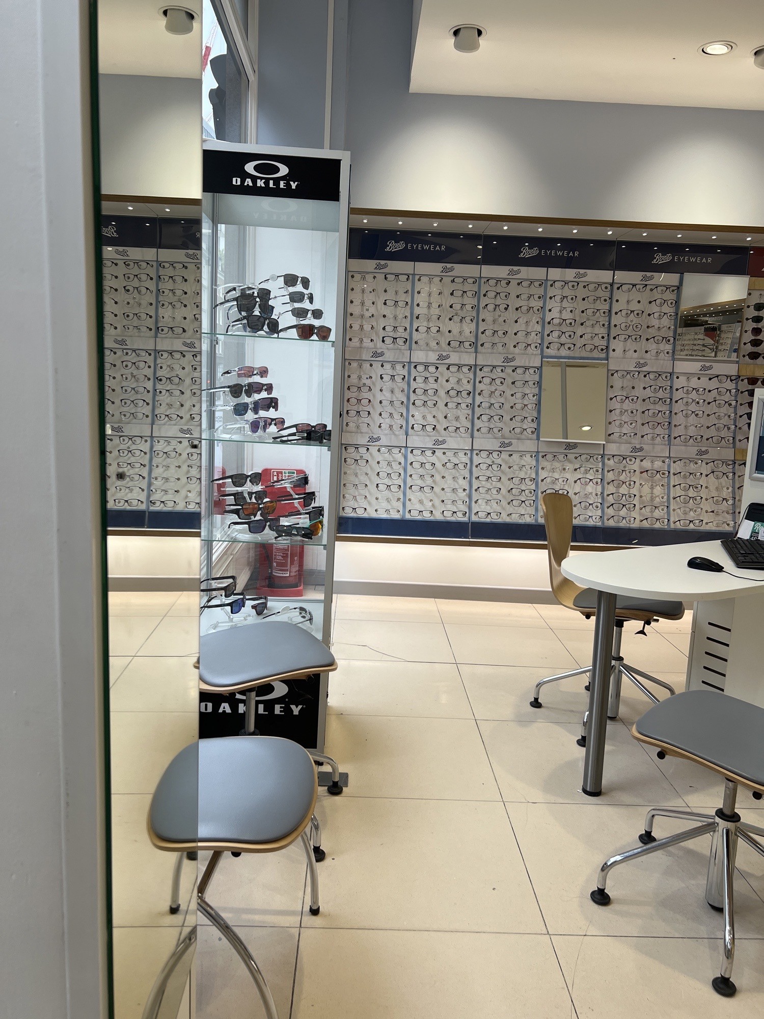 Left side view of look of inside from main entrance . Another customer service desk. narrow space to turn