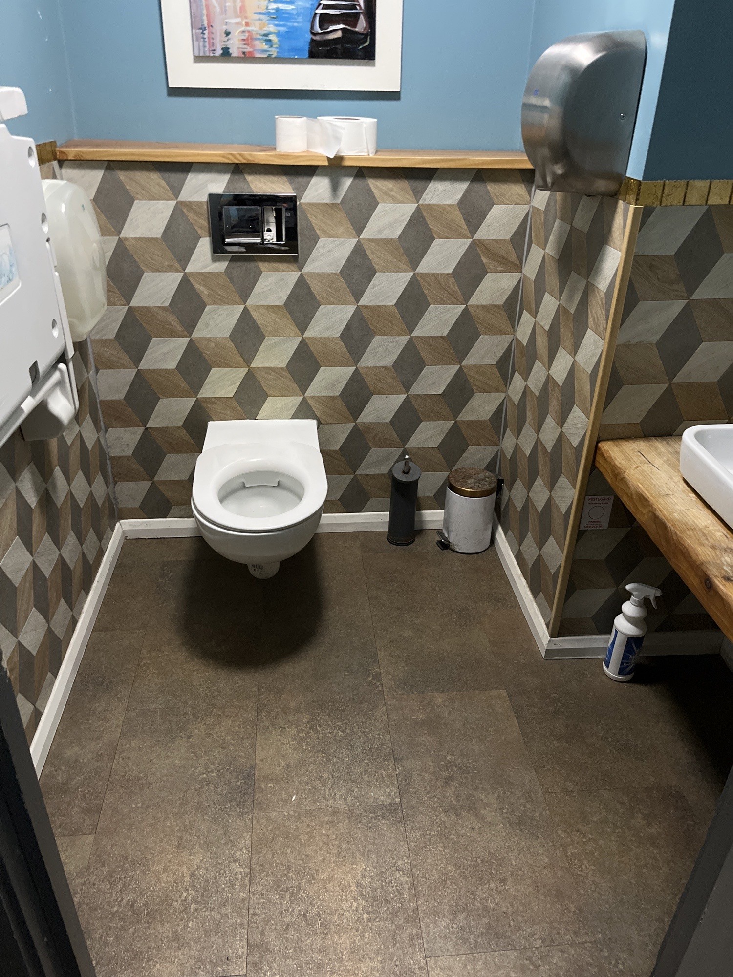 Bathroom with baby changing table that opens