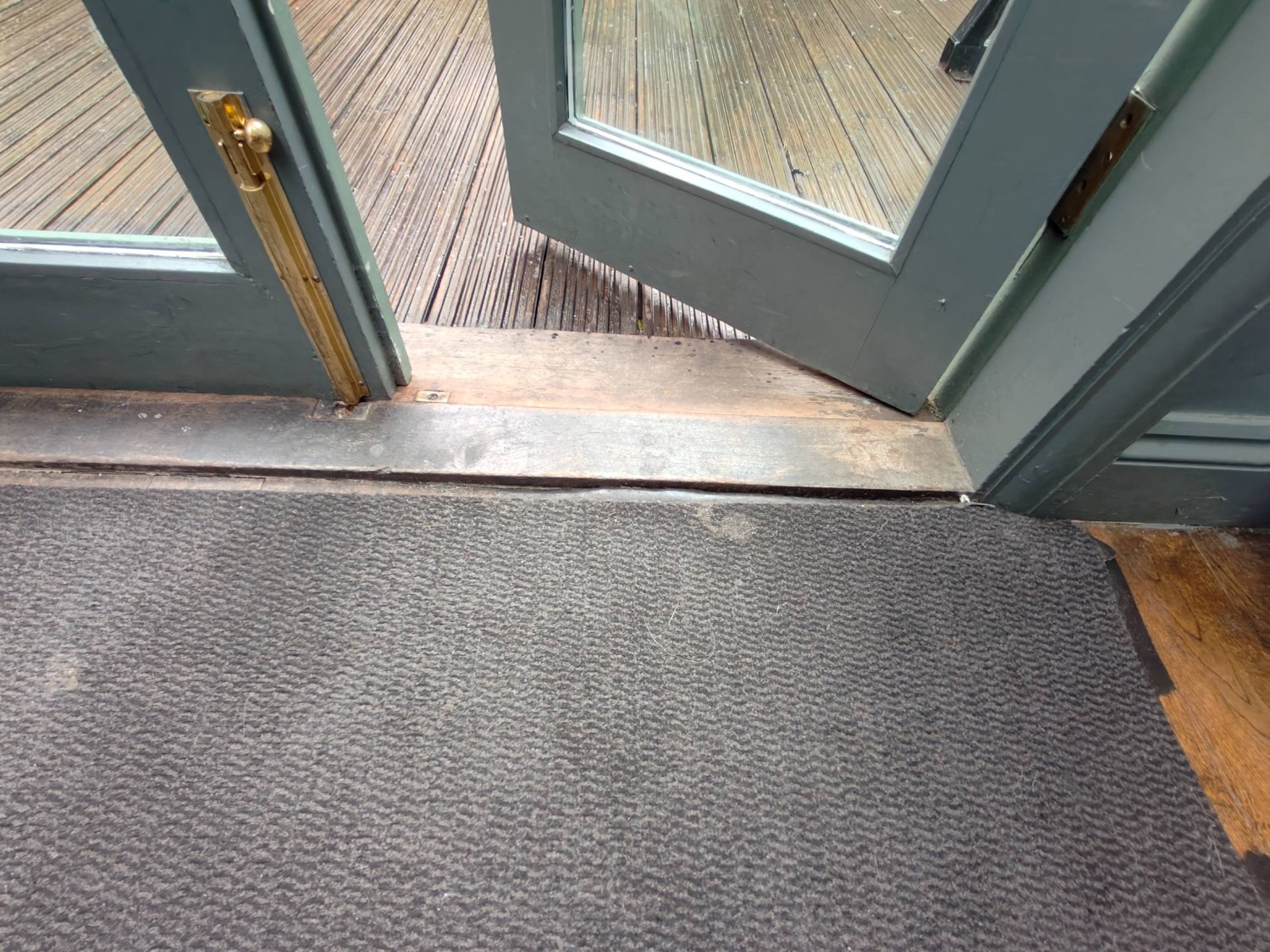 Small bump on threshold of door.