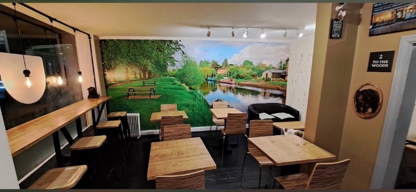 the main seating area with tables and chairs neatly laid out.