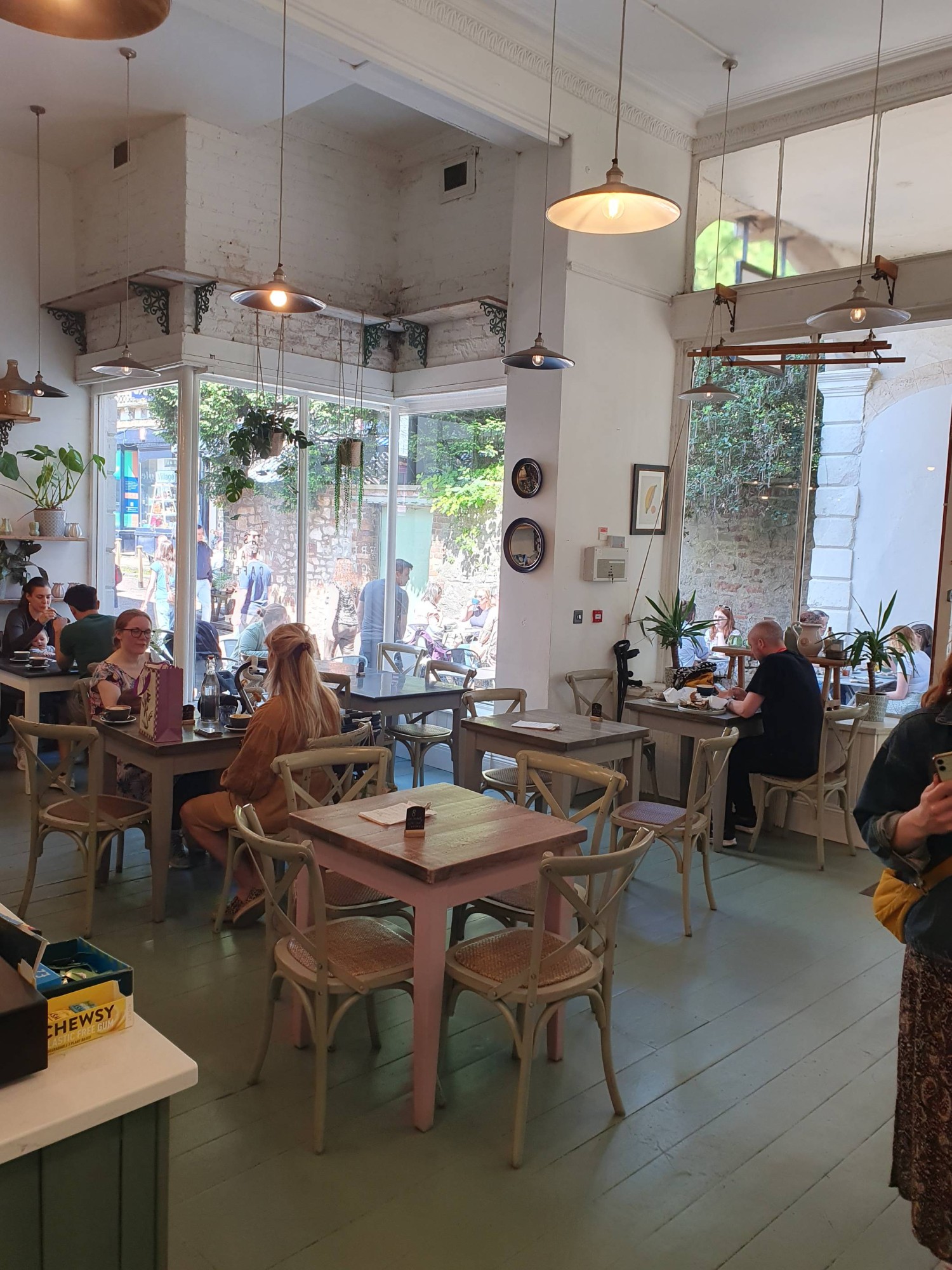 Photo from stage right of the counter towards cafe seating
