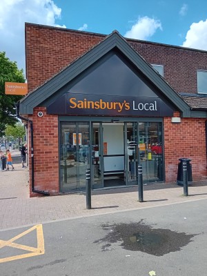 The front door to the Sainsburys Local is electronic and fairly wide when opened.