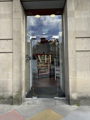 Entrance door opens outwards from right to left. Long handle on right.