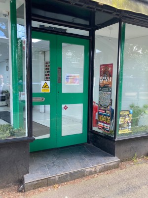 Entrance. Step up to double doors.
