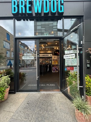 Glass double doors open outwards from the centre with vertical handle.