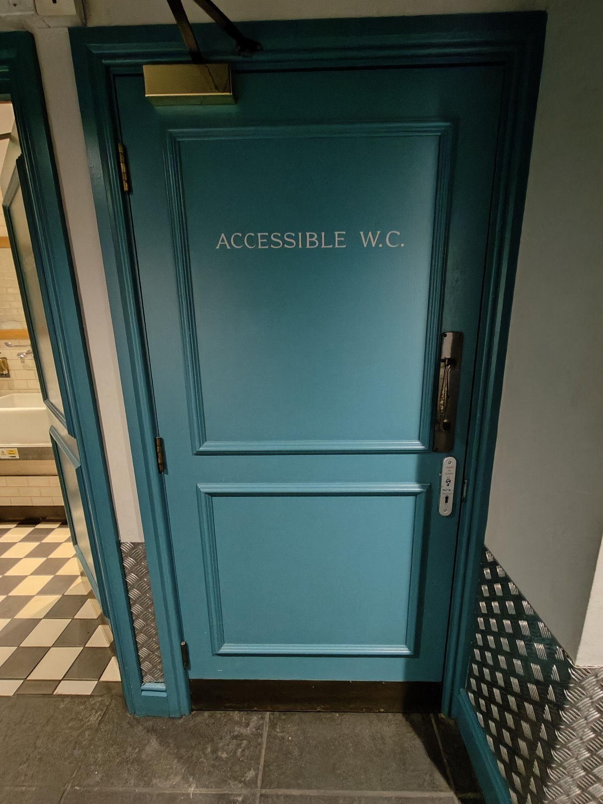 From end of path facing right. Blue toilet door ahead. Use radar key on right to pull silver handle on right to open.