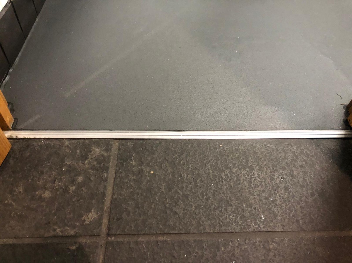 Small bump on threshold of door.