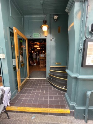 Blue archway at entrance to the venue.